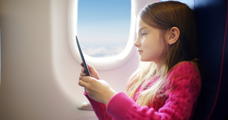 Child on airplane FAQS: Can I Name A Guardian Who Lives Abroad for My Child?| Mario Godoy | Lombard Estate Planning Lawyer